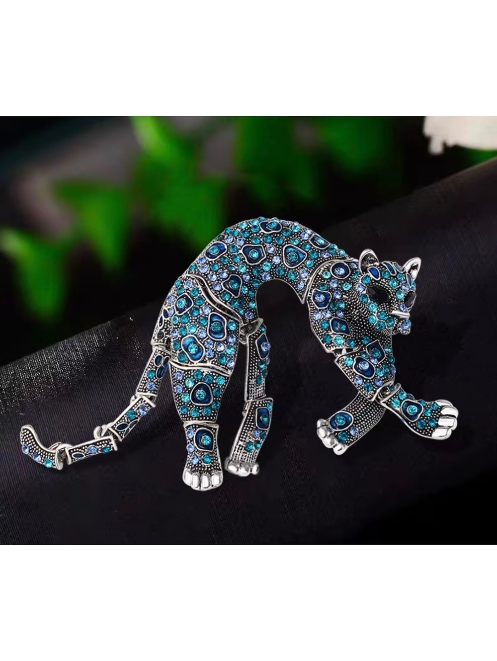 Vintage Silver Tone Articulated Panther Brooch with Blue Rhinestones
